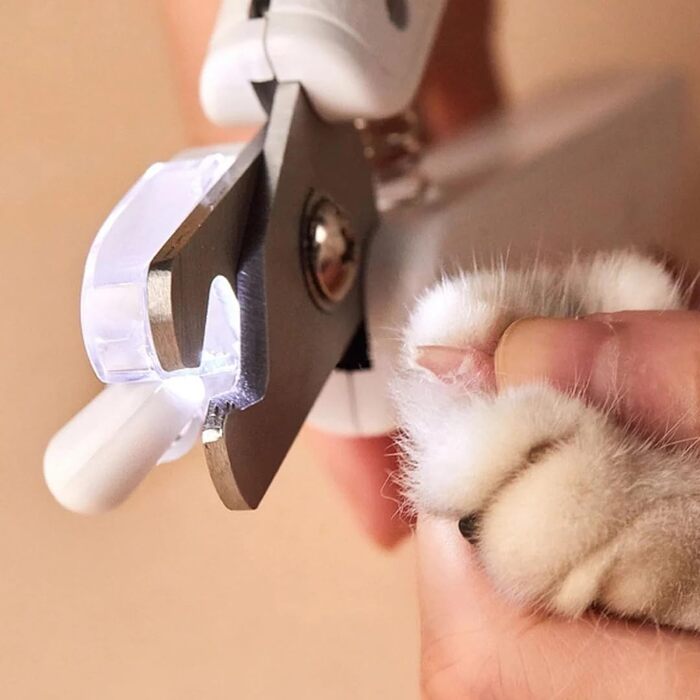 Pawloo LED-Кліпер для обрізання кігтів собак та котів з LED-підсвічуванням, білий. Включає пилку для кігтів та захисний ковпачок