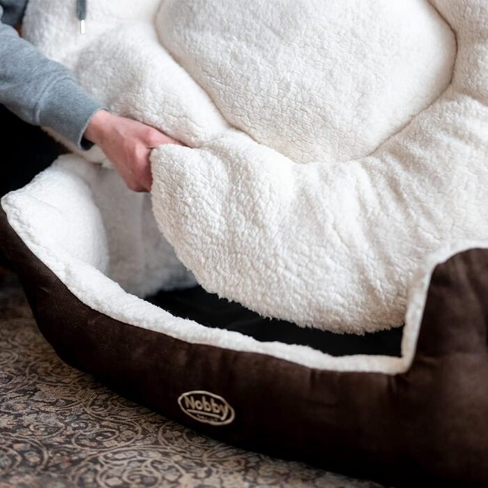 Ліжко для собак Nobby Taika, 66 x 57 x 22 см, коричневе/вовняно-біле, комфортне