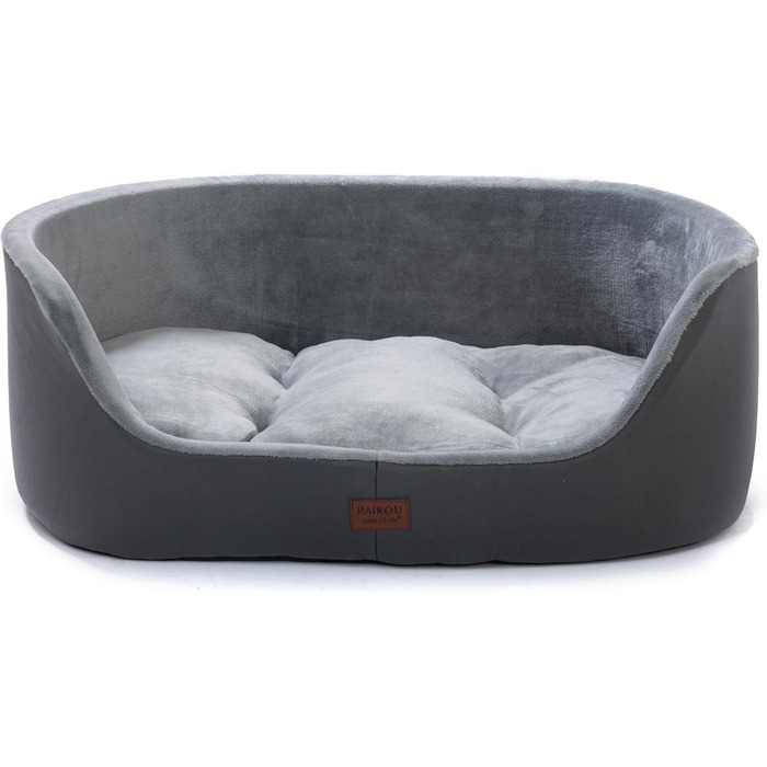 Кругле собаче ліжко RAIKOU середнього розміру, м'яке та зручне, з антиковзким покриттям. Підходить для собак та котів середніх порід (75 x 54 x 27 см), чорного кольору