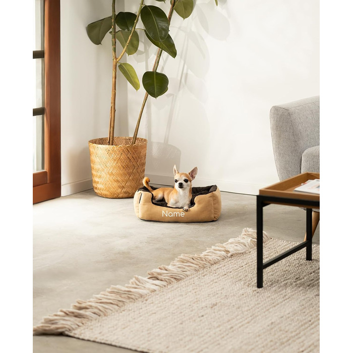 Ліжко для собак Lionto з двостороннім подушками та антиковзною основою, 50x37 см, бежево-коричневе. Підходить для собак та котів будь-якого віку. Міцне, з глибоким входом.