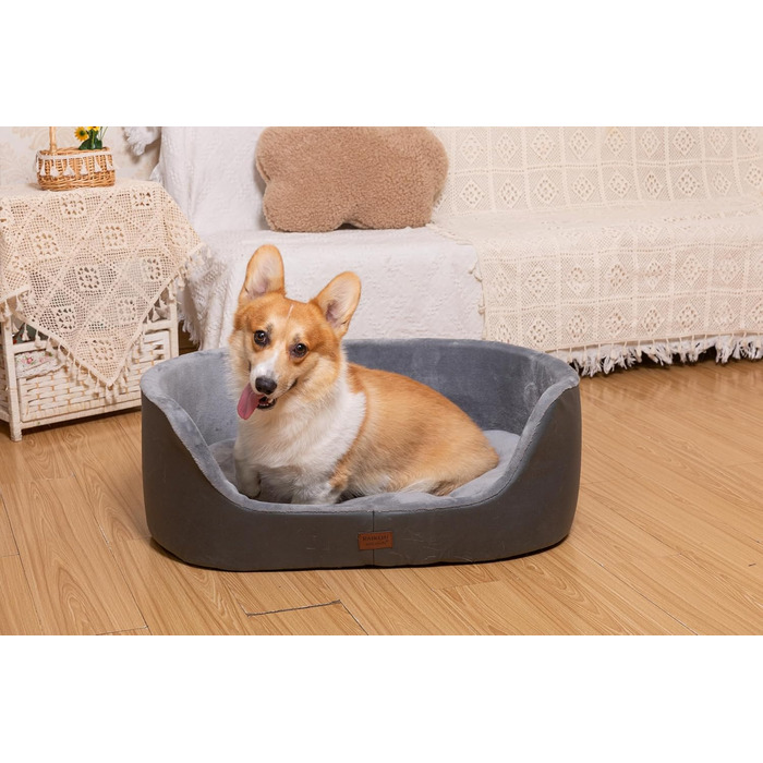 Кругле собаче ліжко RAIKOU середнього розміру, м'яке та зручне, з антиковзким покриттям. Підходить для собак та котів середніх порід (60 x 43 x 22 см, чорний)