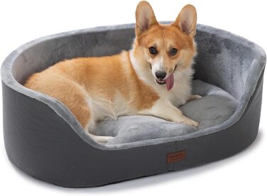 Кругле собаче ліжко RAIKOU середнього розміру, м'яке та зручне, з антиковзким покриттям. Підходить для собак та котів середніх порід (60 x 43 x 22 см, чорний)